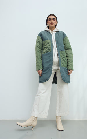 REVERSIBLE SUSTAINABLE DOWN COAT