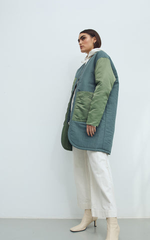 REVERSIBLE SUSTAINABLE DOWN COAT