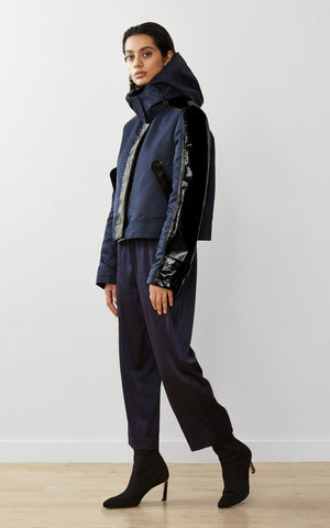 WATER-RESISTANT SUSTAINABLE CROPPED RAINCOAT